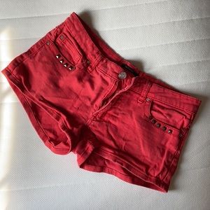 Red studded shorts